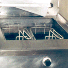 Photograph of a deep fat fryer after cleaning by Greasebusters.